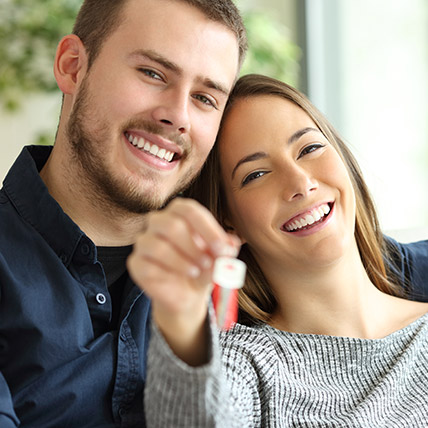 man and woman smiling