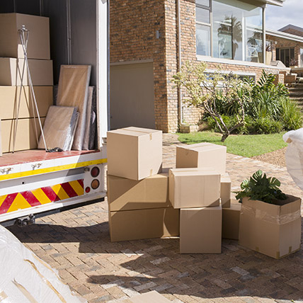 removal boxes outside a house